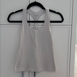 White Racerback Tank Top from lululemon. Size 4. Good condition.